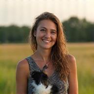Emma with border collie in field